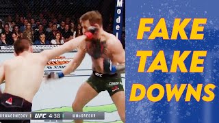 quotTAKEDOWN FEINTSquot in UFCMMA Big Brain Fake Takedowns [upl. by Atinehs700]